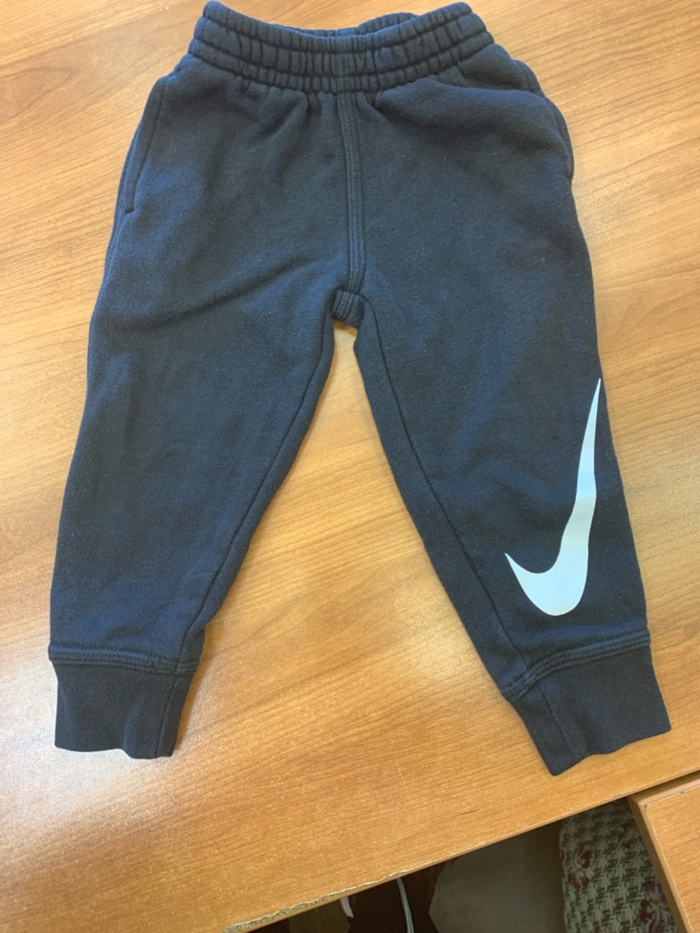 Nike Kids Black Joggers with White Swoosh